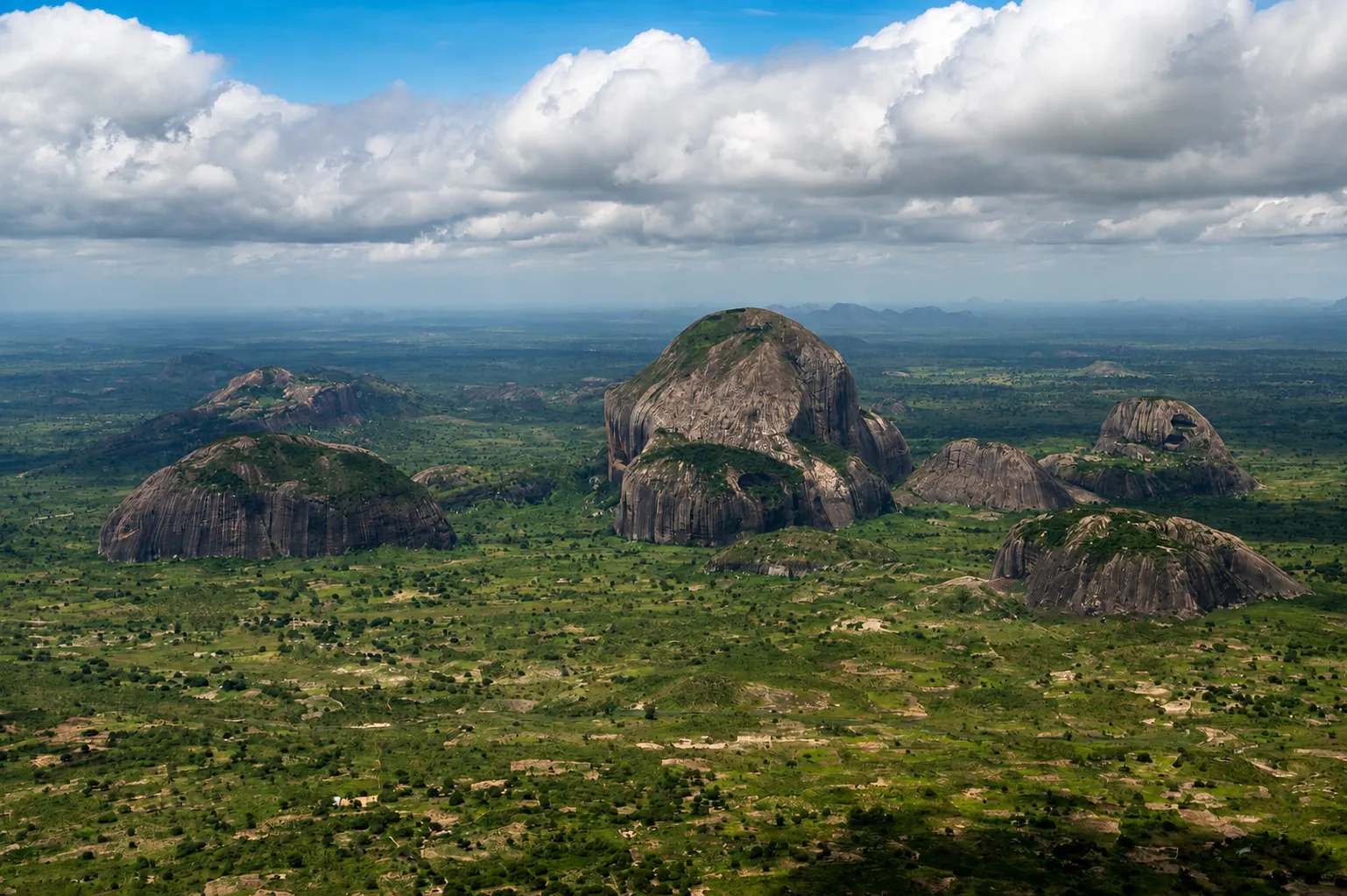 Granite inselbergs rising over the green plains of Cabo Delgado, northern Mozambique